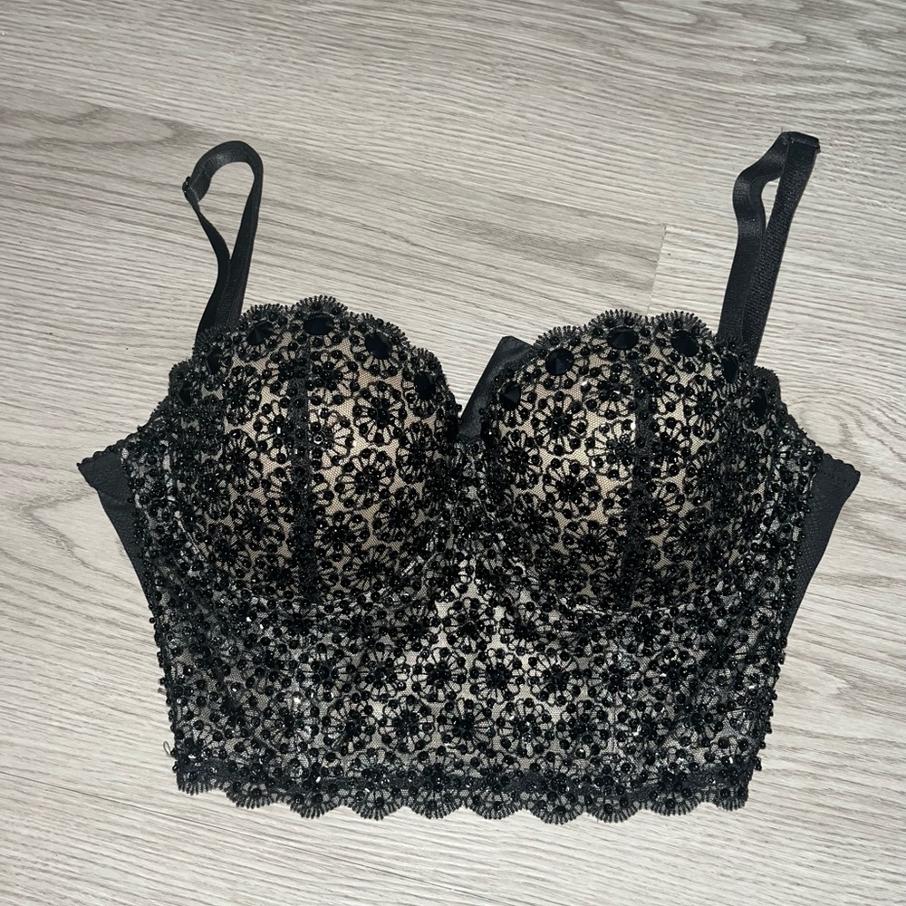 Sequined black corset.
